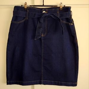 Denim skirt, dark wash with tie belt.